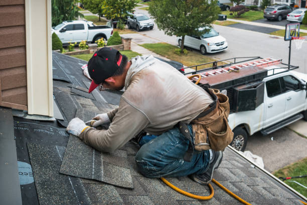 Professional Roof Replacement technician working in Hebron, CT